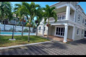 Villa Palmira 6 suites avec piscine 5 min à pied de la plage Pereybere